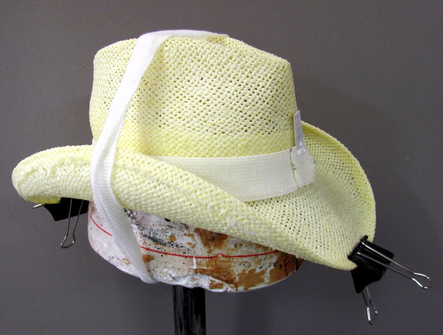 stretching a straw hat