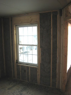 picture of wall cavity with nu-wool cellulose insulation