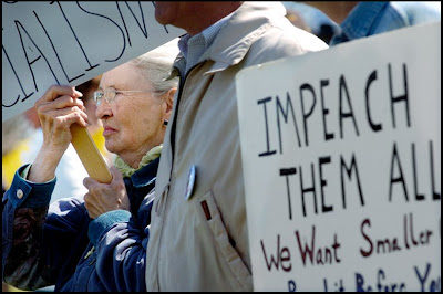 [Lady+with+Sign.jpg]