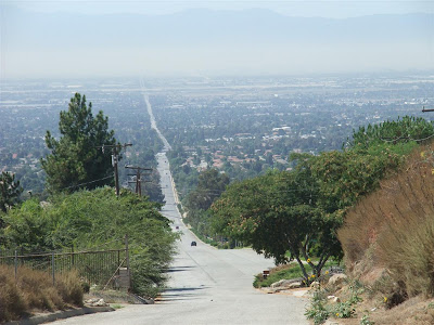 road into california, smog, straight road, hill
