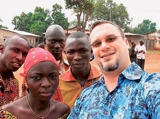 [Carmean+with+Africans.jpg]