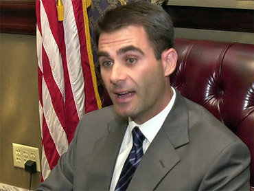 [Andre Baur feeding stray animals.jpg]