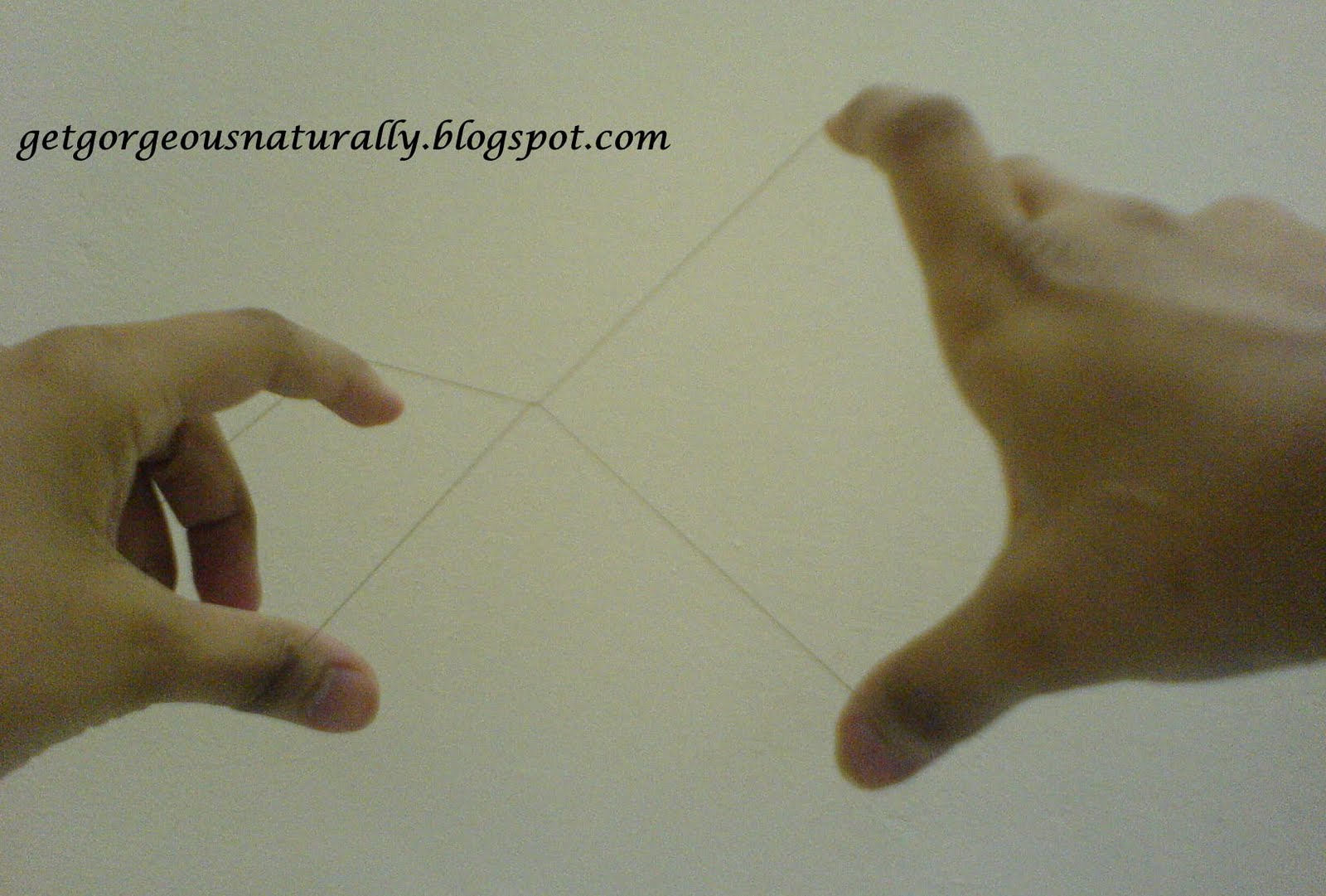 Get Naturally How to thread your upper lips The technique