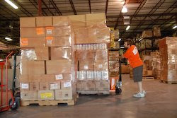 World Vision employee, Jeremy Wissink, readies supplies for transport to the Texas coast.