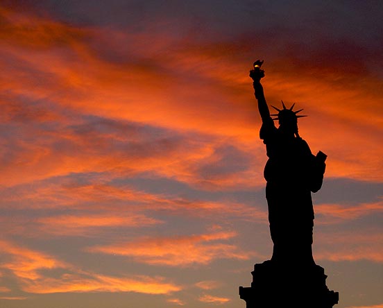 [statue+of+liberty+at+dusk.jpg]
