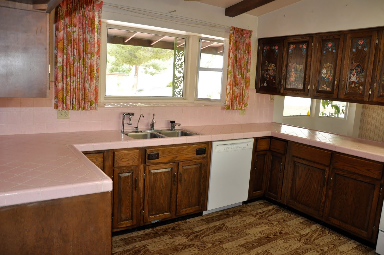Pink kitchen cabinets Pink plastic inserts in the upper cabinets.
