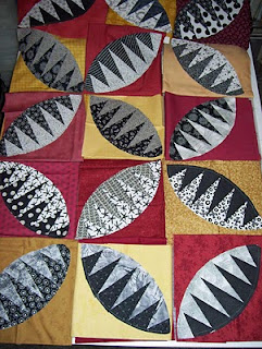 Selecting fabric colors for the background squares of my Rattlesnake quilt.