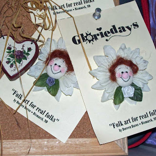 Here's a view of some funny flower lapel pins I made.