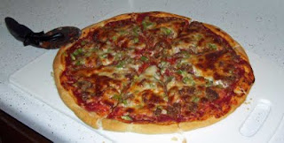 I cut my pizza on an extra large cutting board so my pans do not get marred up.