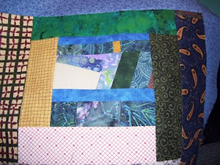 My scrappy quilt has a newly titled category: The Improv Quilt.