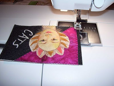 Zig-zag stitch around the outer perimeter of each postcard to prevent fraying of the fabric.