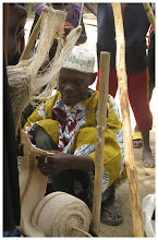 Sierra Leone, weaver using a traditional loom