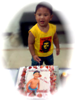 Birthday Boy Cutting His Cake