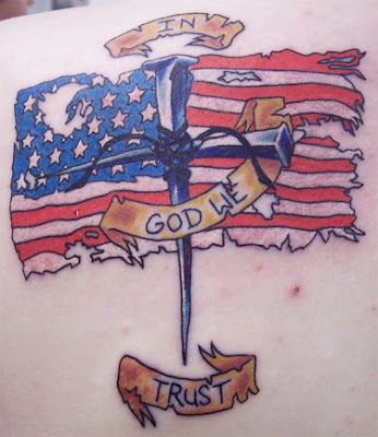 Cross of nails tattoo-tattered American flag-banner that says "In God we Cross of nails tattoo-tattered American flag-banner that says "In God we