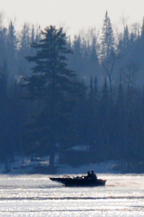 Boat on melting lake 2 - Vermilion 3-16-08