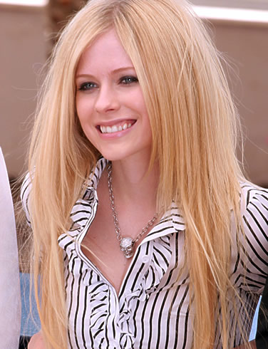In 1998 Lavigne won a radio contest to perform with fellow Canadian singer 