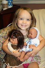 Elle with her dolls