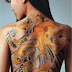 Amazing Color Full Lower Back Tattoos