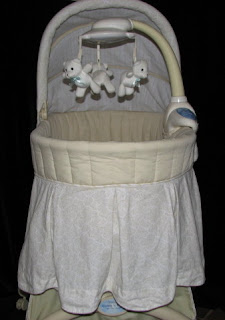 kolcraft cuddle n care rocking bassinet