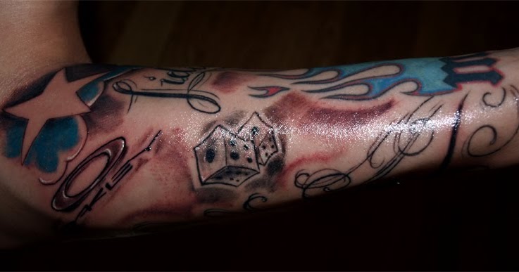 CosaFina tattoo Carlos Art Studio: Motocross tattoo