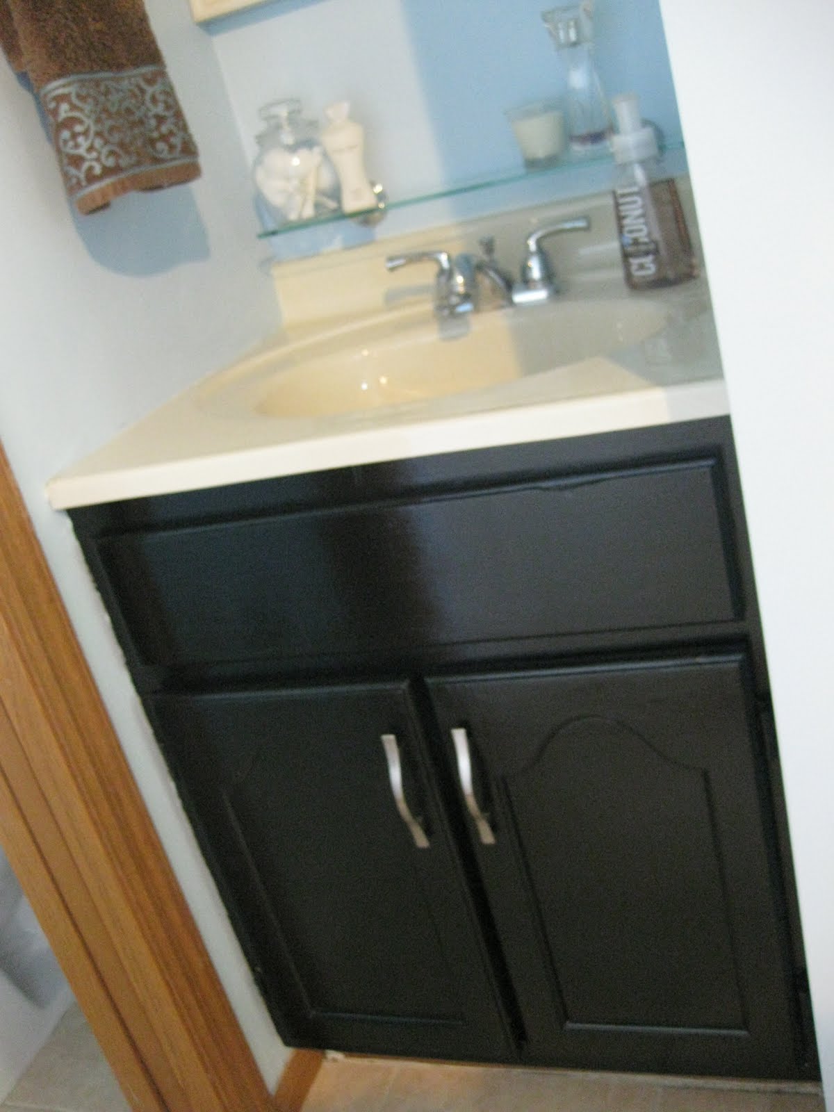 Bathroom faucets brushed nickel We also put up an ultra sleek looking glass shelf above our faucet: