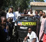 Angela Kirwin with Tanzanian Roots & Shoots youth.