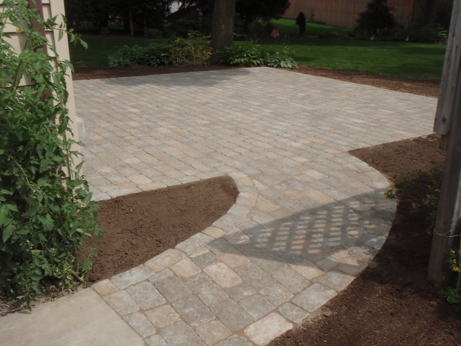 Grading, Landscaping, Paver Patios, Retaining Walls and Yard Drainage
