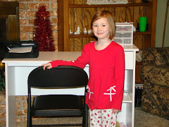 Emma with her very own desk