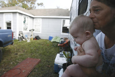 Elizabeth Jones of San Leon sits with her four-month-old grandchild