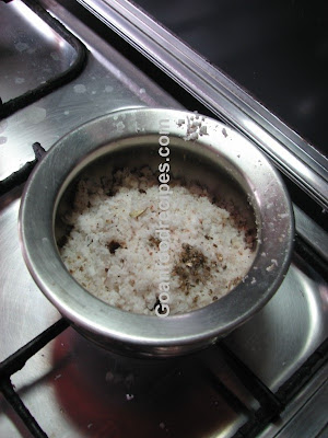 Add cardamom to the coconut jaggery mixture