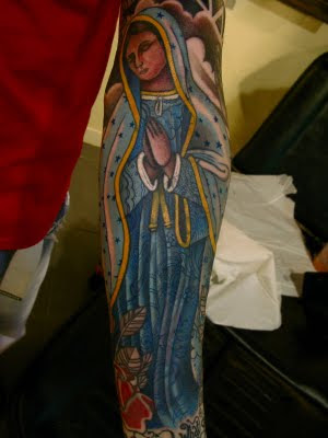 mexican style sleeve tattoo