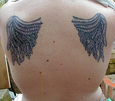 Angel Wings Tattoos, weird tattoo. Posted by Graffiti at 9:06 PM