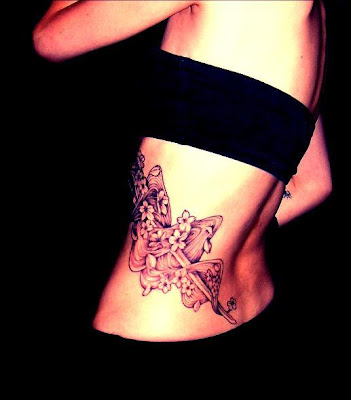 tattoo on ribs girl. flower rib tattoos. Monday, August 3, 2009 tattoo text rib women sexy girls