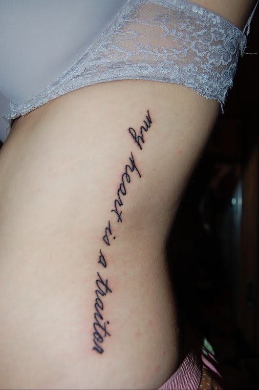 tattoo quotes on ribs. girl tattoos of quotes on ribs. tattoo quotes on ribs. girl