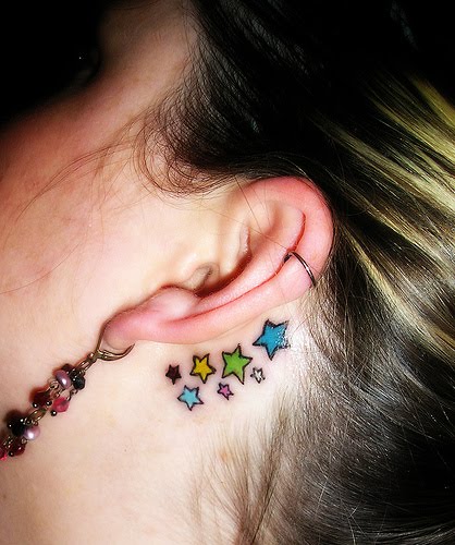 Flower Tattoo Behind Ear. star tattoo behind ear.