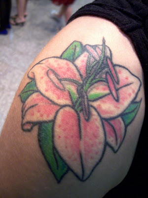 Dana explained that the tattoo is a stargazer lily, inked for inspiration as 
