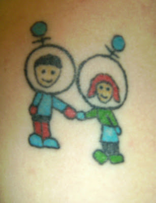  portrait of herself with her brother holding hands. The tattoo is on 