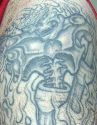 This segment of the tattoo seems inspired by Iron Maiden's album cover This segment of the tattoo seems inspired by Iron Maiden's album cover