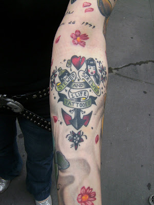 She offered up this tattoo on her left arm which is a modified version of a