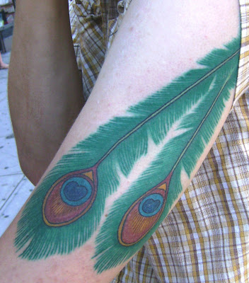 indian feather tattoos. bright feather tattoo. indian feather tattoos. bright