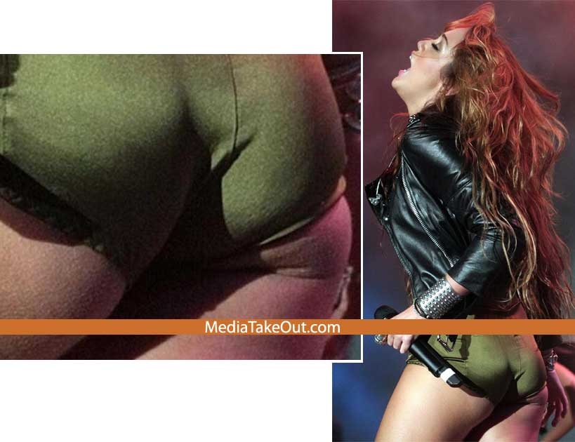 1275225386miley_exposednsfw1.jpg