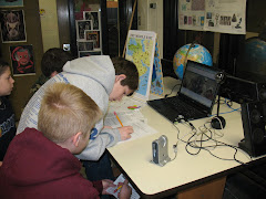 Students videoconferencing with their partner school