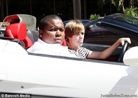 Justin was Driving his White justin bieber driving his car. Justin was Driving his White