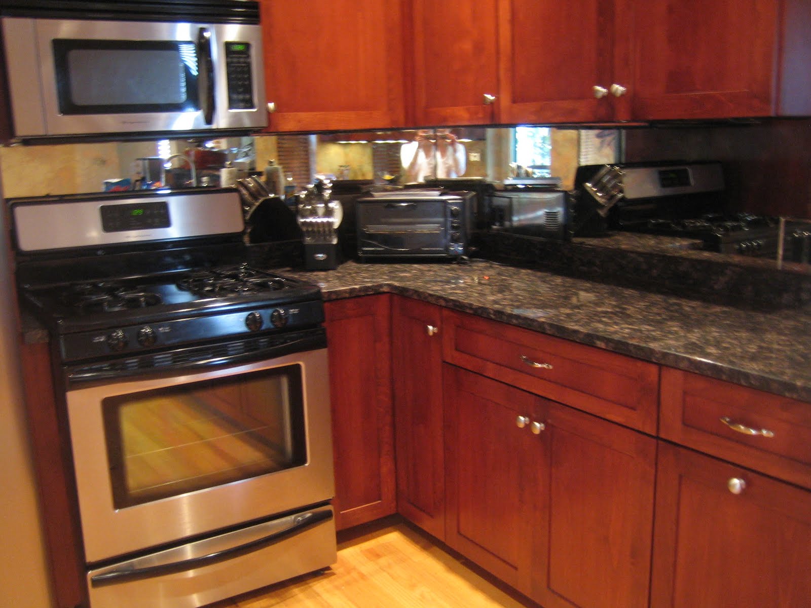 Unique kitchen backsplash ideas Kitchens with Mirror as Backsplash