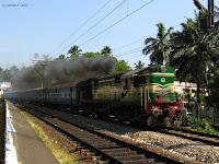 WDM2 smokes up with a passenger train near Vanchiyoor