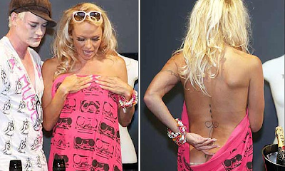 Pamela Anderson casi en topless