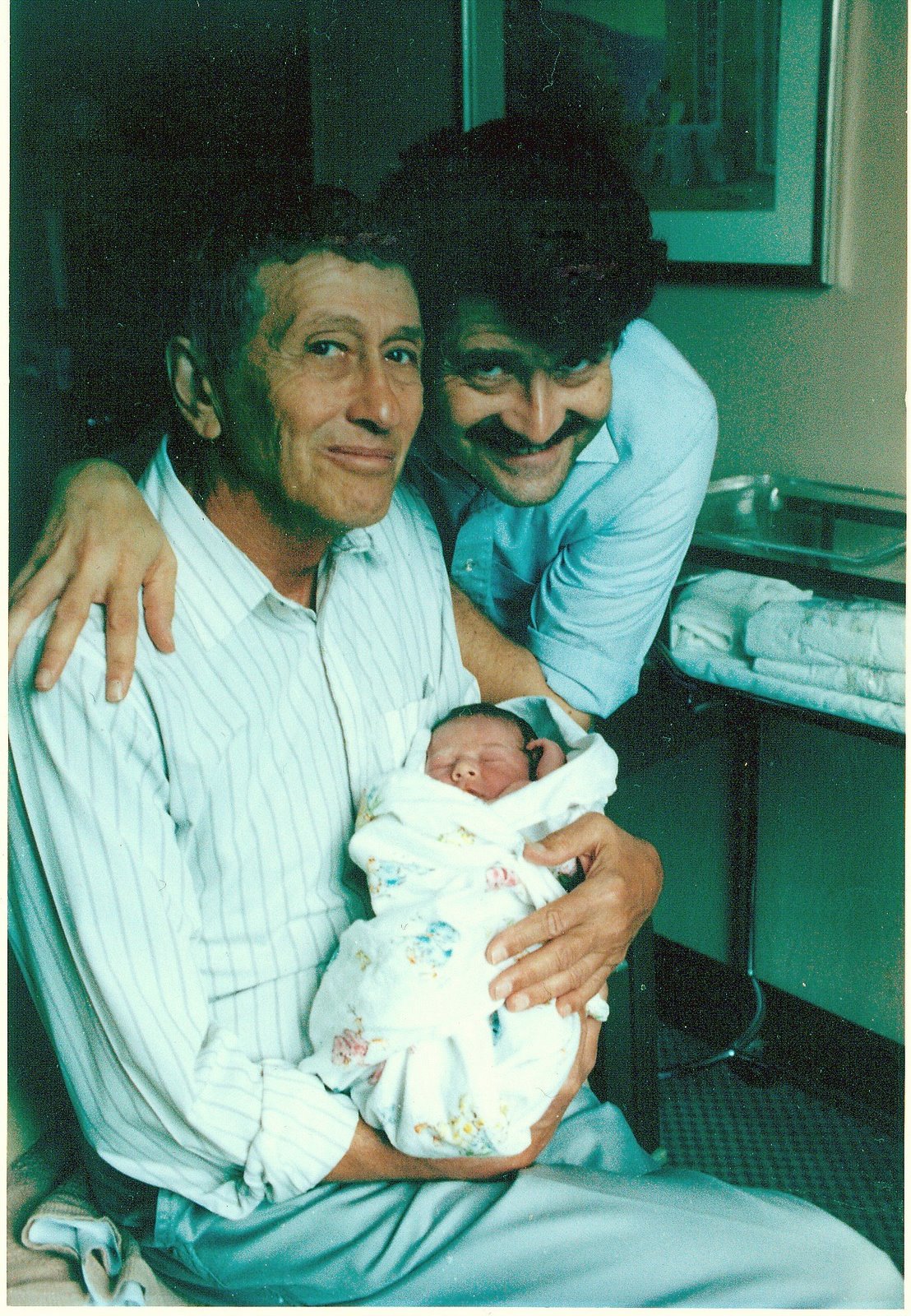 [Newborn+Danny+with+Zayde+and+Baba+in+hospital+7-31-92.jpg]