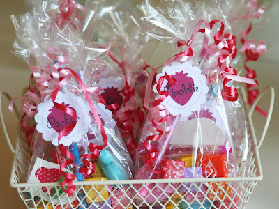 Then I punched them out and tied them to the goodie bags with more curling Then I punched them out and tied them to the goodie bags with more curling