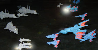 The Arcadian Fleet closes with the Eldar left flank