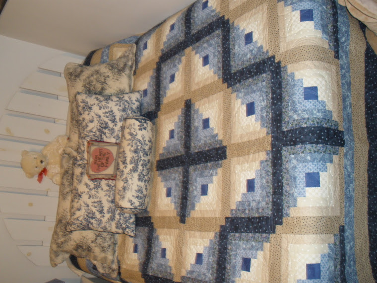 My Log Cabin Quilt on my guest bed